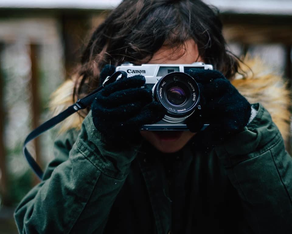 image of a photographer with a camera